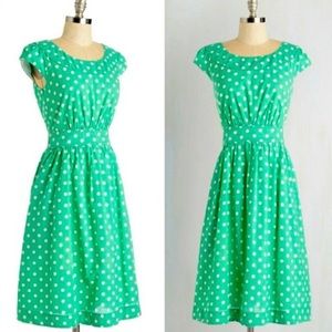 Emily and Fin Rachel dress in mint green with white polka dots